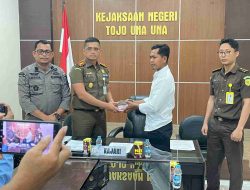 Tegakkan Transparansi, Kejari Touna Pulihkan Dana Desa Kolami Melalui Pengembalian Kerugian Negara